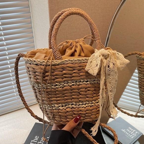 New Woven Bag Women's Spring Niche Design Portable Bucket Bag Crossbody Shoulder Straw Bag