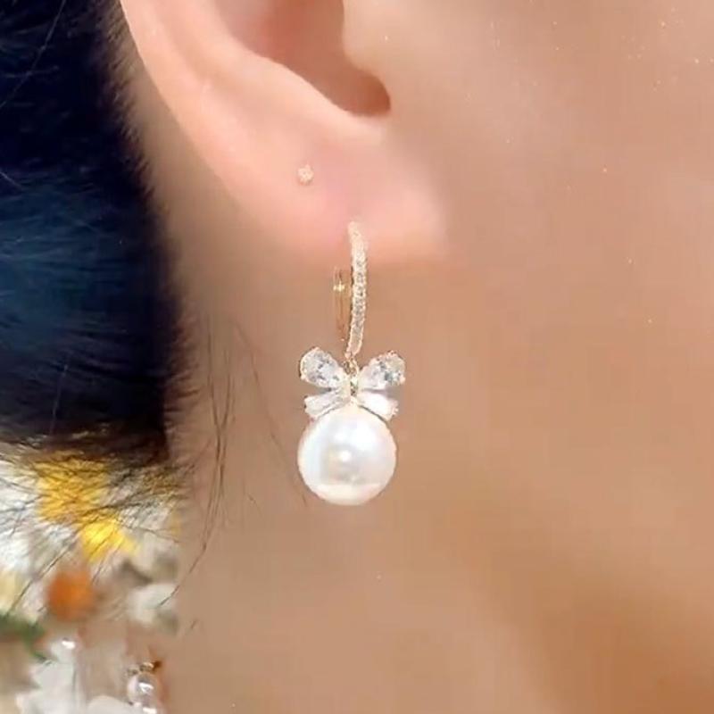 Temperament Bow Pearl Ear Buttons Light Luxury Sense of Senior Sense of Popular Earrings Temperament Hundred with The Fashionable Earrings