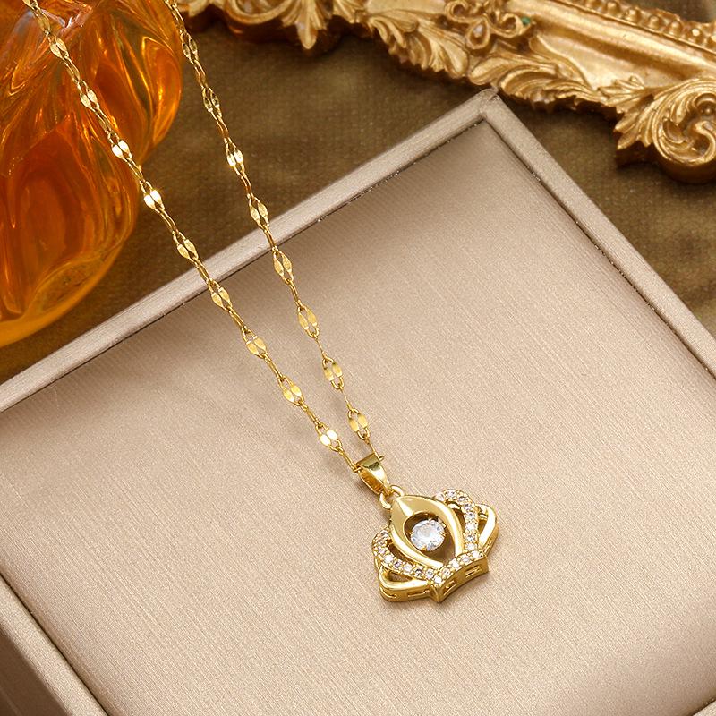 Lively Crown Titanium Necklace: Elegant Zirconia Pendant for Women's Distinctive Style.