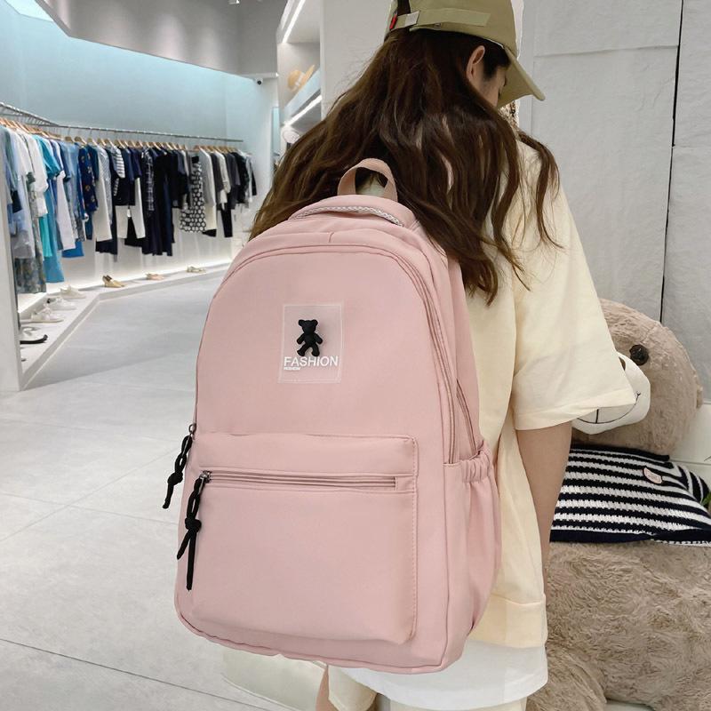 

Повседневный простой рюкзак женский летний новый однотонный большой вместимости школьная сумка для учеников средней и старшей школы розовый
