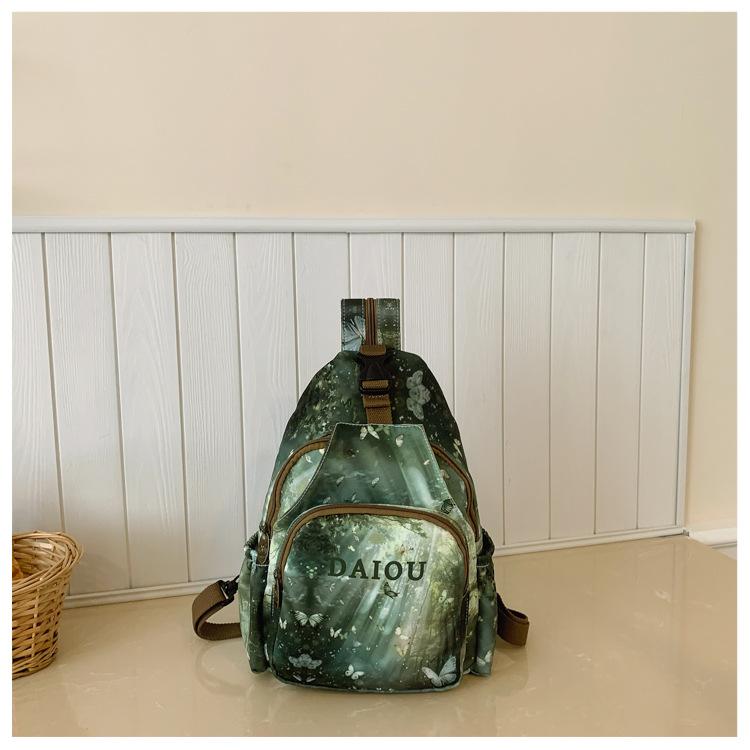 

Summer bag women s printed letter backpack 2025 new niche design commuting travel backpack