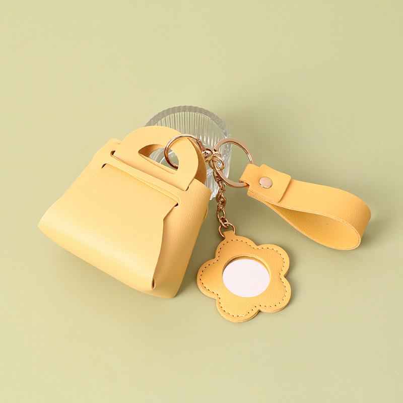 Korean Style Creative PU Leather Keychain: Mini Mirror, Storage Bag, Solid Color Wallet