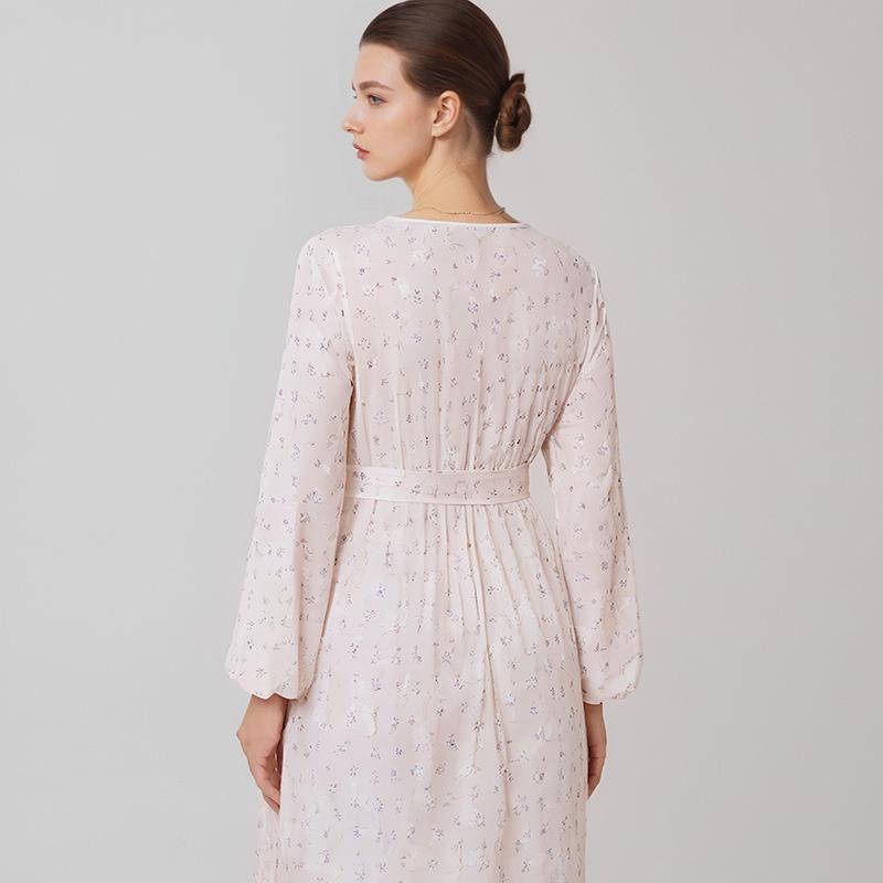 This Spring New Laid-back Plus-size Dress Features A Printed V-necklong Sleeves A Cinched Waist and Floral Patterns Exuding An Elegant Charm