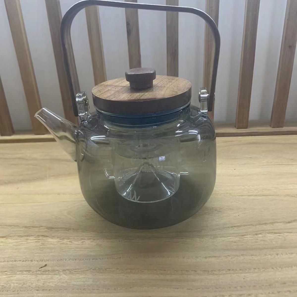 

Жаропрочный стеклянный чайник с ручкой и набором для заваривания чая для электрической керамической плиты.