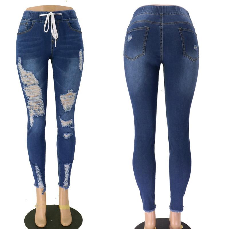Jeans skinny con elastico in vita, vita media, strappati, allacciati in pizzo per donna
