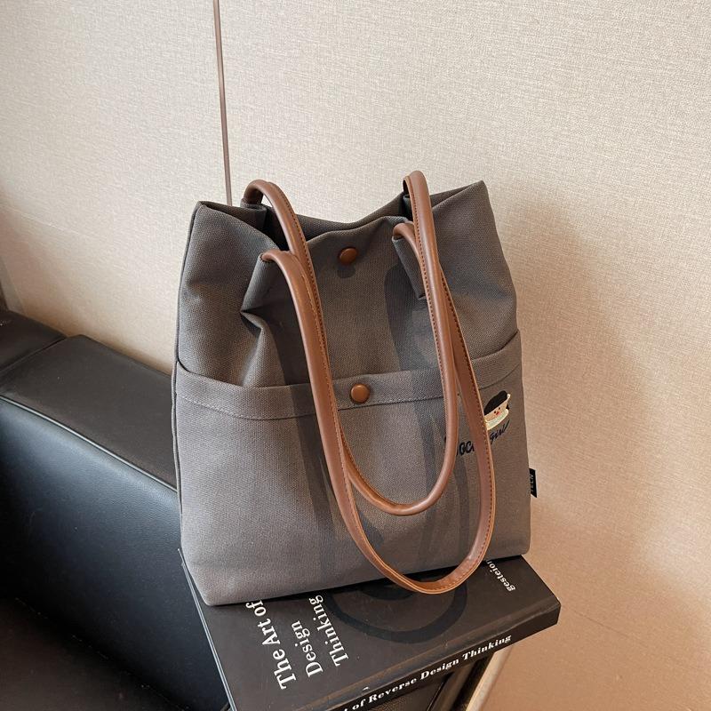 Casual versatile canvas bag women's new light commuter shoulder bag large capacity tote bag