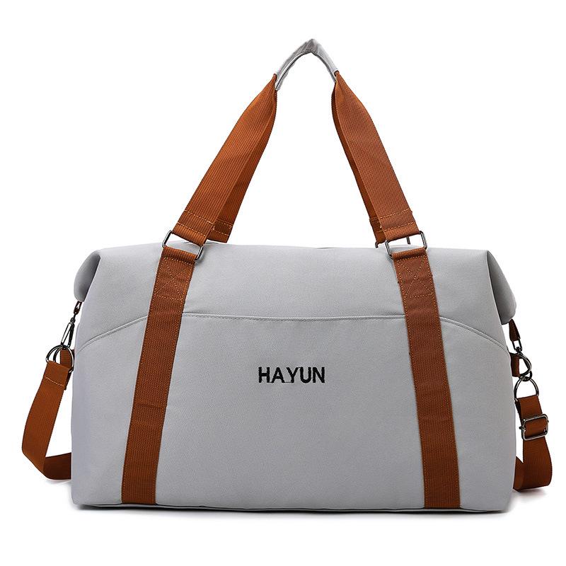 

Water-Repellent Oxford Cloth Sports Bag with Wet/Dry Separation, Large Capacity, Portable for Travel