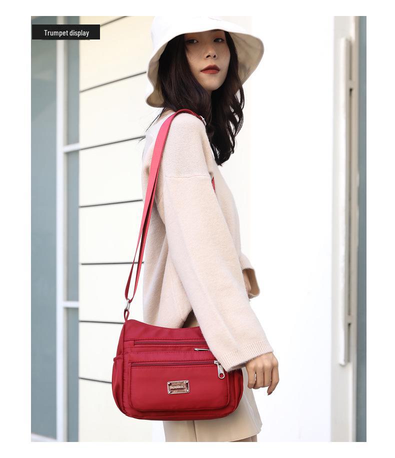 Bolsa de ombro feminina de lona de nylon de grande capacidade: Bolsa de mensageiro com vários compartimentos para mães de meia-idade e idosas