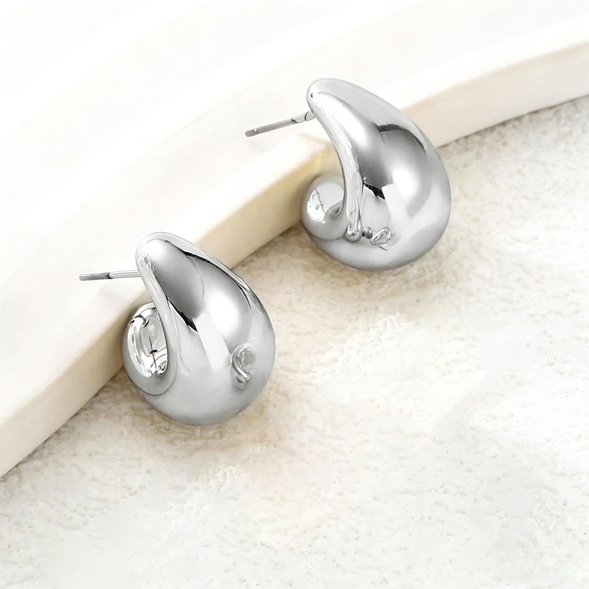

Water drop stud earrings simple temperament lightweight Doudou stud earrings light luxury ears серебряный