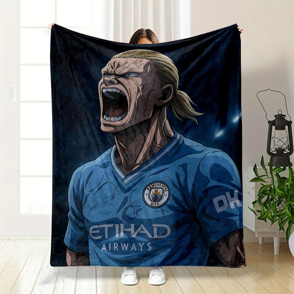 The pattern depicts a fierce animated figure in a blue soccer jersey. for all seasons blanket lunch break throw gift