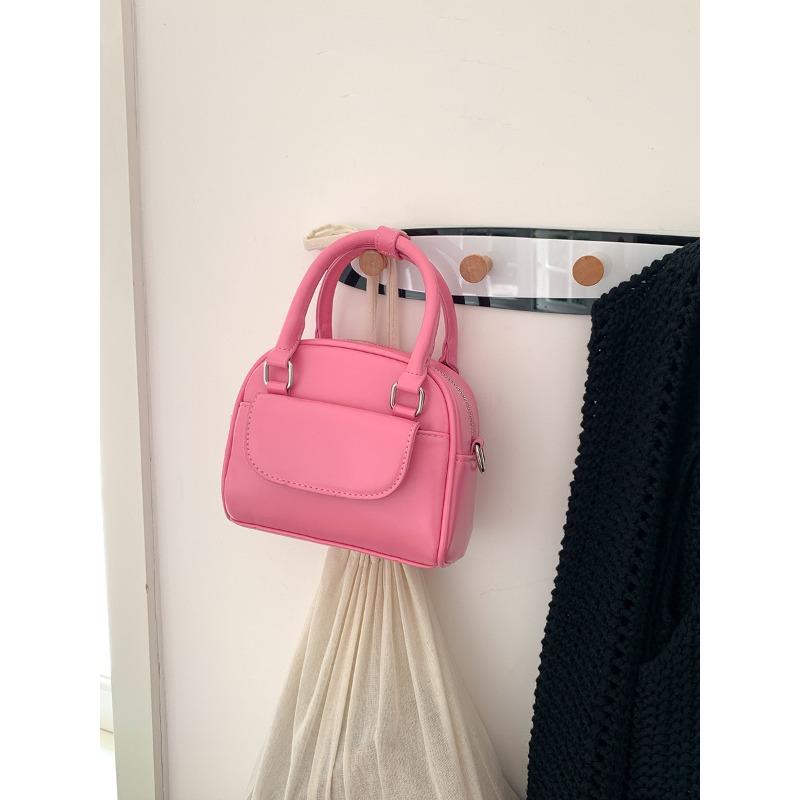 

Bowling bag women s niche new small messenger bag women s versatile mni portable saddle bag розовый