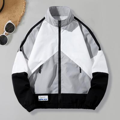 Pánský kabát Colorblock Patchwork Stojáček Zapínání na zip Dlouhé rukávy Volný Střední délka