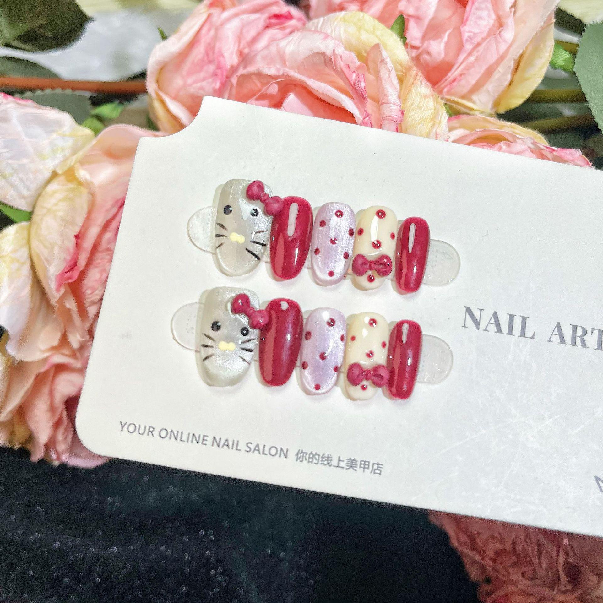 

Клубнично-розовые короткие ногти «кошачий глаз» в горошек с дизайном в виде бантика Polka Dot Strawberry