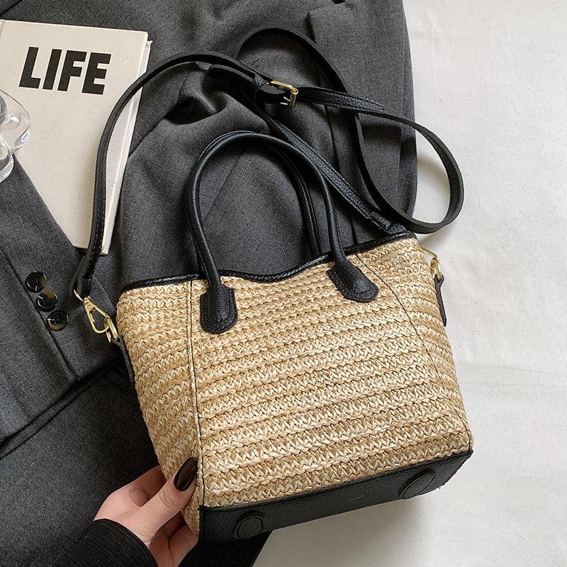 2025 New Niche Design Contrasting Colors Straw Hand-held Bucket Bag Leisure Commuting Vacation Wind Messenger Beach Bag Women