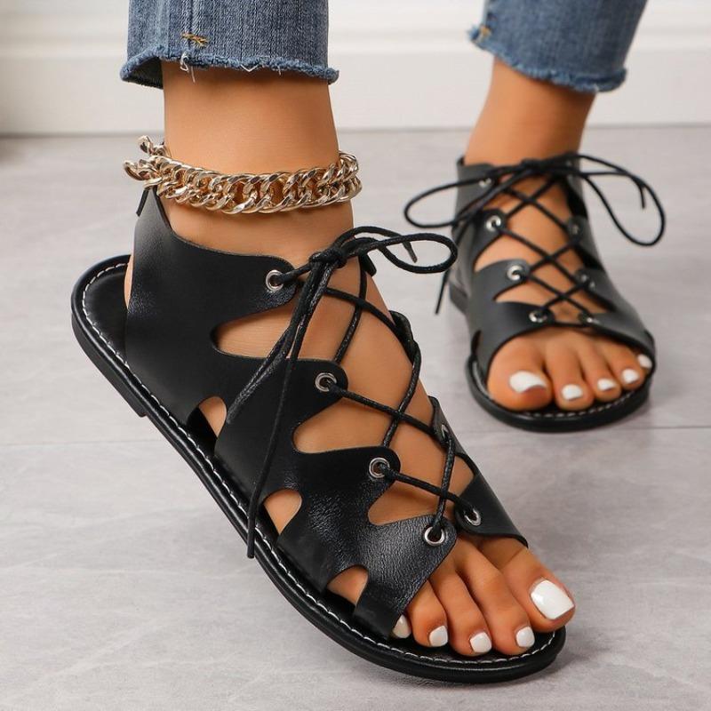 Flat open-toed crossed thin strap cool slippers women's new fringed shoes hollow women's sandals