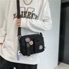 Unisex Plain Color Crossbody Bag, Casual Zipper Shoulder Bag with Astronaut Charm & Random Badge, Versatile Daily Messenger Bag