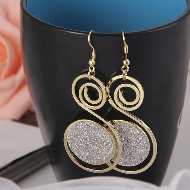 Frosted Geometric Leaf Tassel Earrings - Creative Hollow Round Design