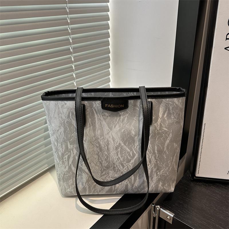 

Commuter bag Large capacity handbag 2025 spring and summer new versatile ins high sense of work shoulder tote bag