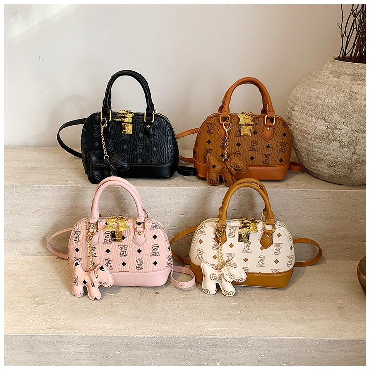 Temperament handbag small bag messenger bag high-end shell bag women's new bear print niche fashion