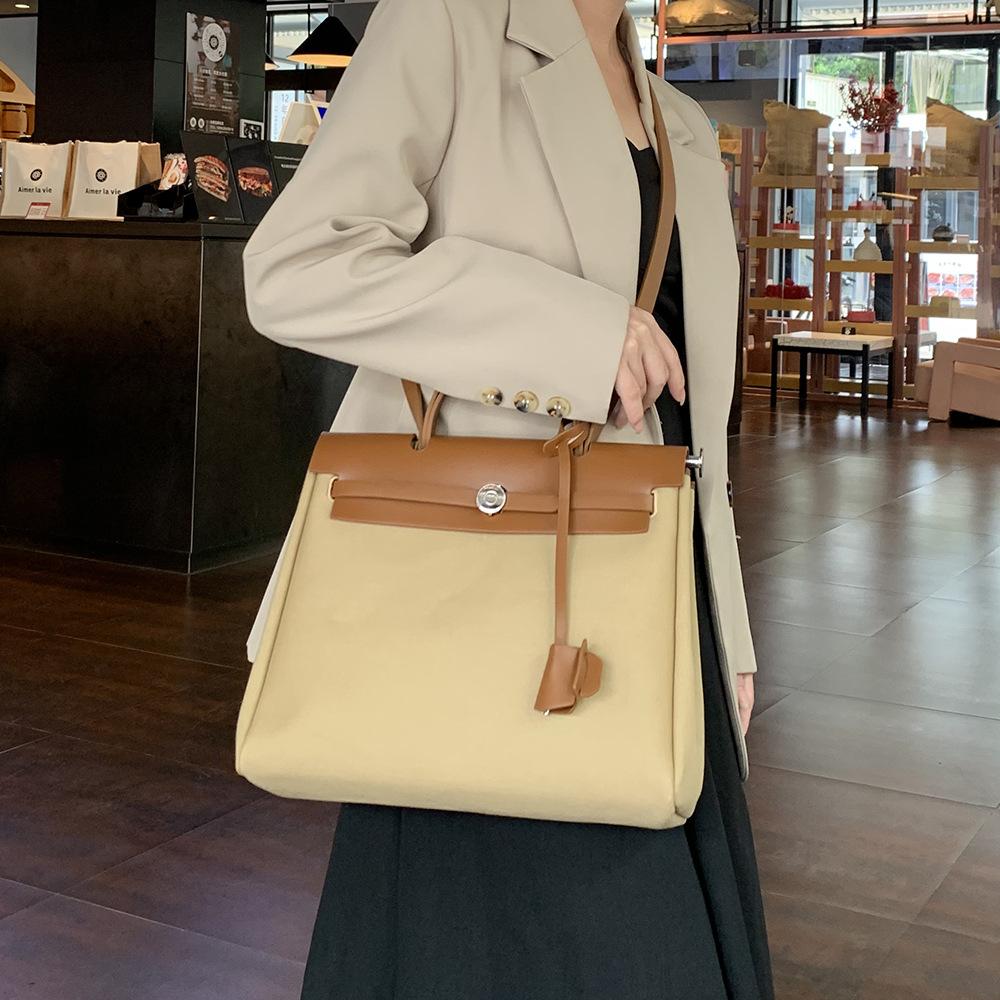 New Autumn and Winter Fashion Women's Handbag, Niche High-end Waterproof Canvas Crossbody Bag with Button Closure and Flap Design, Kelly Bag