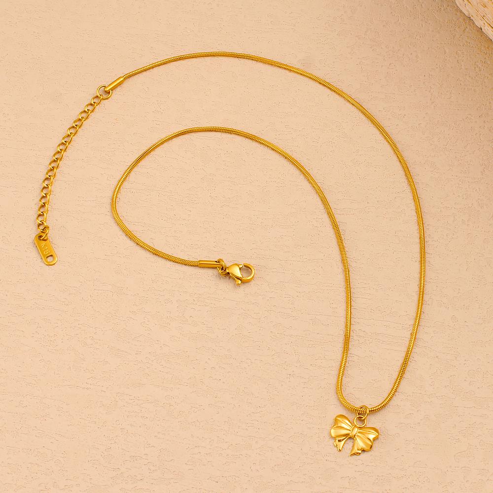 18K Gold Titanium Steel Bow Pendant Necklace with Snake Chain - European & American Design