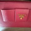 Used PRADA long wallet ribbon round zipper