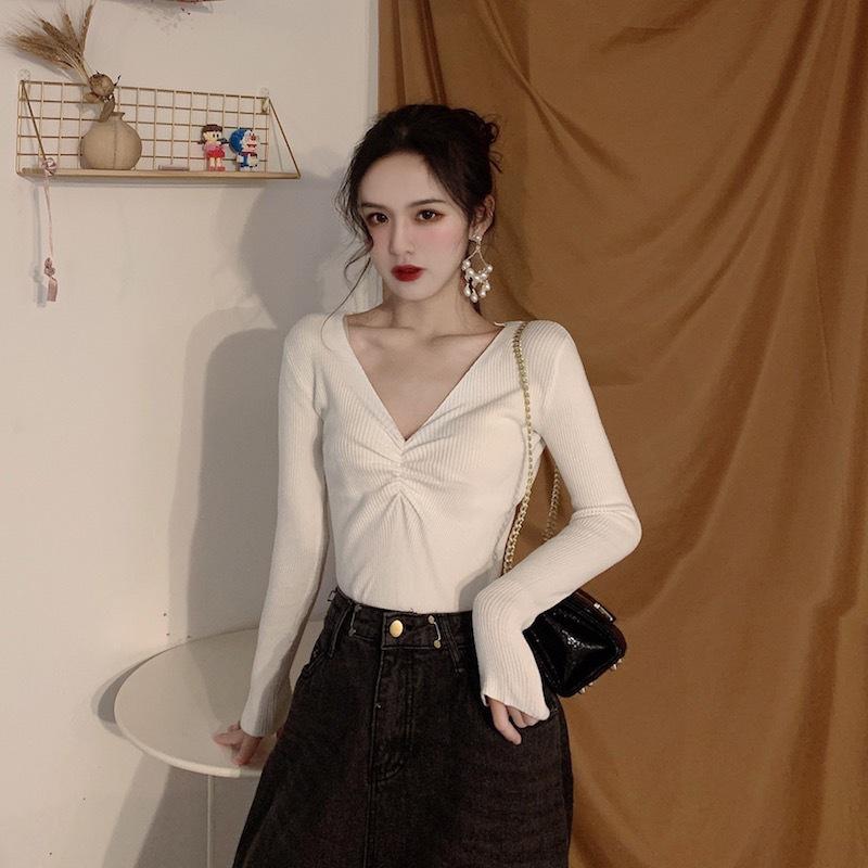 Otoño Invierno mujer cuello en V Color sólido manga larga plisado parte inferior de punto suéter elegante
