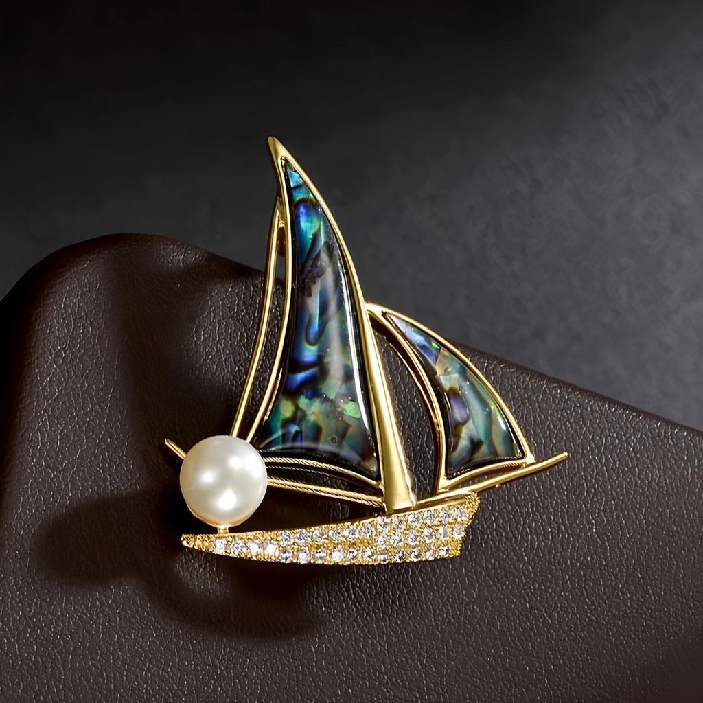 The "Smooth Sailing" Brooch Is A High-end Women's Design with A Unique and Exquisite Sailboat Corsage