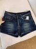 Spicy Girl Retro Washed Denim Shorts: Women's 2025 Summer Sexy Slimming Hip-Hugging Hot Pants Trend.