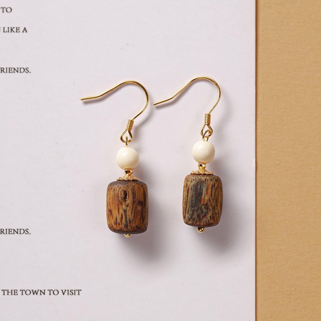 

Hainan Yingge Green Agarwood Bracelet Earrings with Southern Red Mammoth Ivory Sinkwood