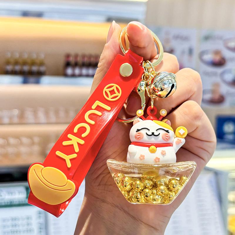 Akrylový přívěsek na klíče s tekutým pískem a obsahem oleje - Perfektní malý dárek na tašku nebo do auta.