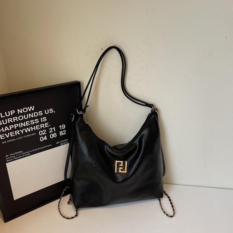 

Women s bag summer new multi-back method retro solid color casual large-capacity tote bag single shoulder crossbody backpack чорний