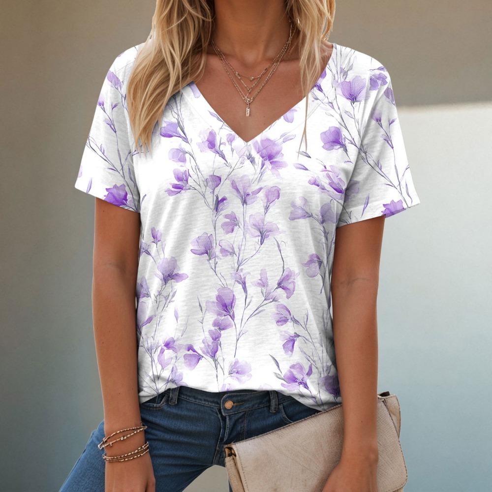 T-shirt estiva casual e alla moda con scollo a V, maniche corte e fantasia per donna. Stile ampio e casual, adatto da indossare per le signore.