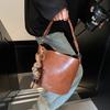 Retro niche design bag women's new high-end texture versatile messenger bag portable bucket bag