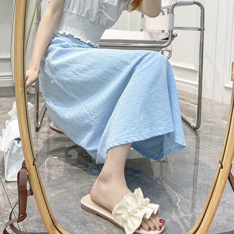 Cool slippers women's summer outer wear ins tide 2025 new fashion fairy wind sweet pearl flower flat bottom one-word drag