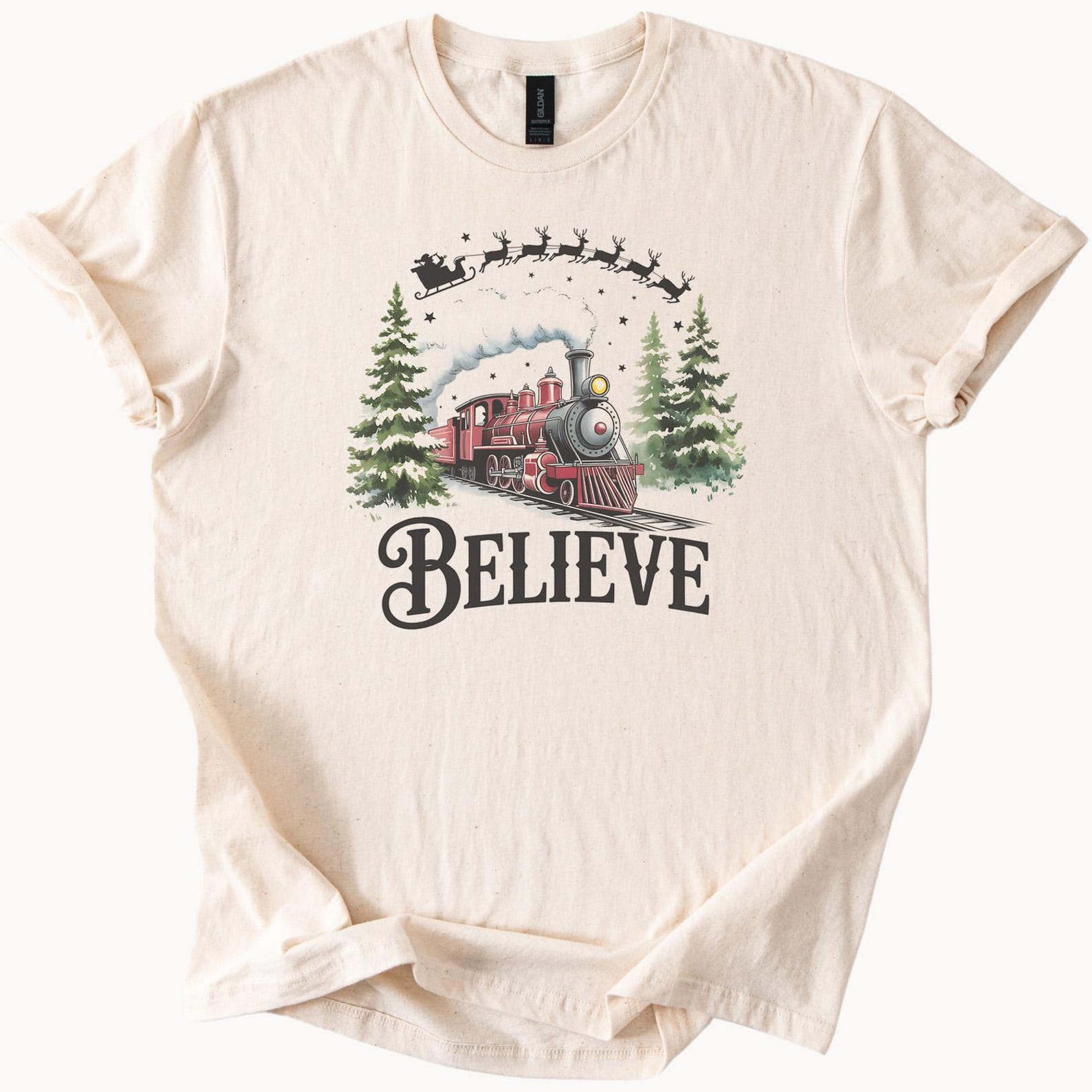 Christmas Train Believe Graphic Shirt Santa Sleigh Reindeer Holiday Forest Scene Unique Joyful Tee Festive Winter Adult Christmas Shirt 120