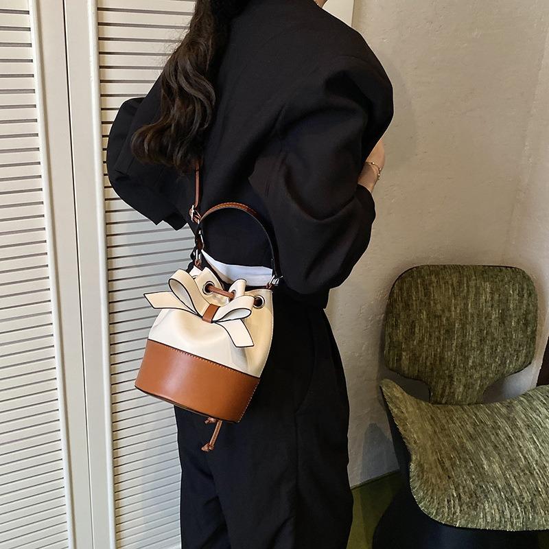 Bow portable small bag women's summer new trendy fashion contrasting color bucket bag shoulder messenger bag