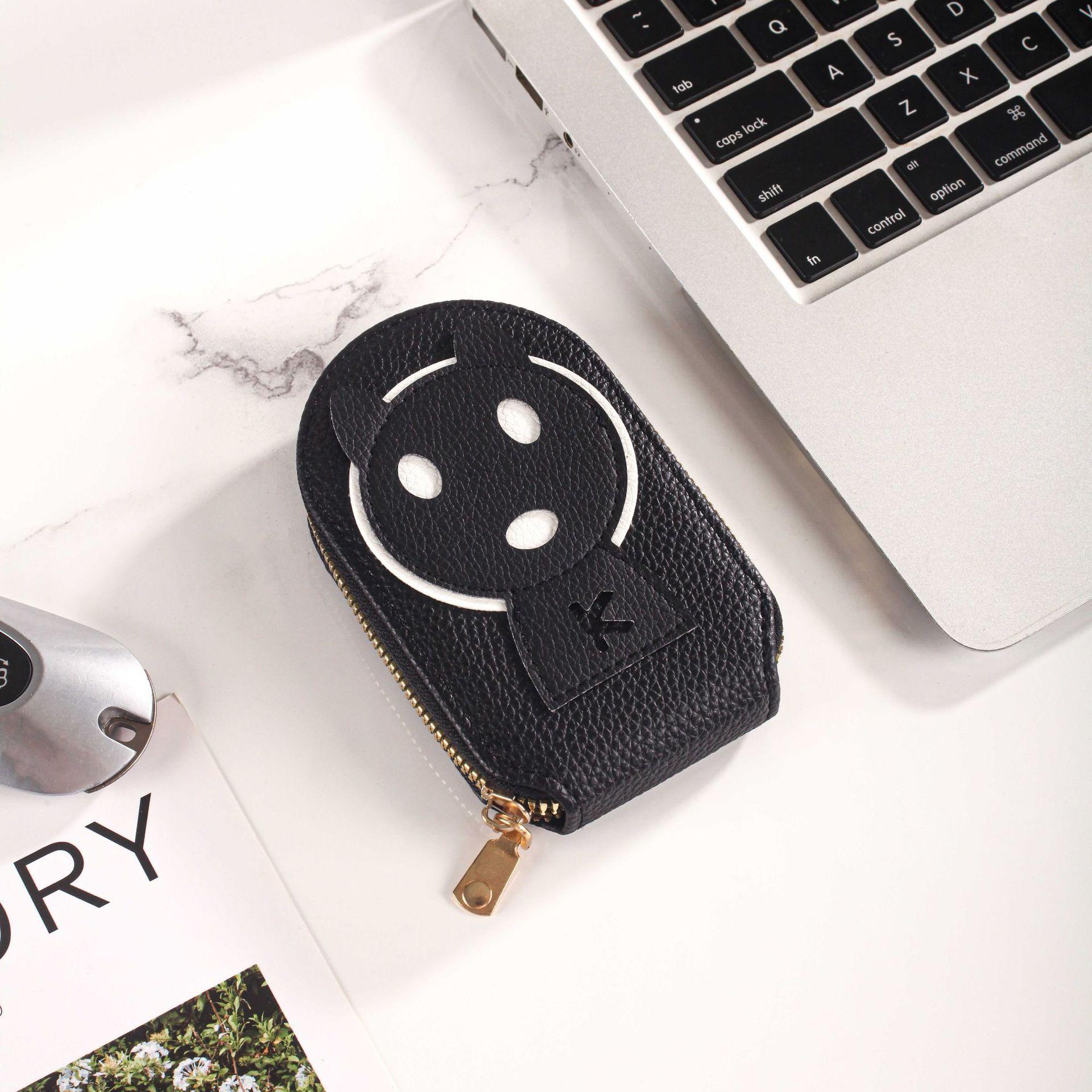 

New card bag, cute little monster, leather zipper organ card bag, change bag, multi-card coin bag, change bag. 7.5*11.5*2.3 чёрный