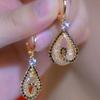 Elegant and High-end Gold Wire Mesh Wrapped Water Droplet Earrings for Women's New Trendy and Versatile Earrings