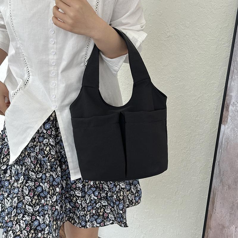 Women's casual simple solid color multipocket summer new fashion go out portable handbag