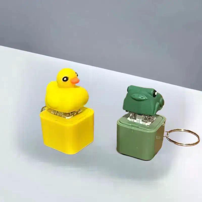 Lustiger Quakende Frosch Ente Schlüsselanhänger Wiederaufladbare Tastatur Fidget Klicker Sound Schlüsselanhänger Mit LED-Licht Zum Stressabbau