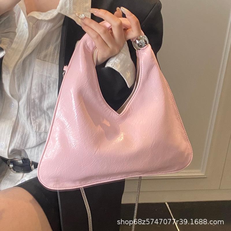 Niche design portable small bag women's 2025 new fashion versatile underarm shoulder bag commuting temperament hand bag