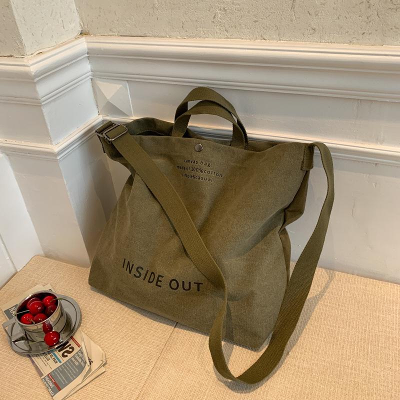 

Полотняна сумка великої місткості Сумка-месенджер Корейська версія ins Жіноча сумка Жіноча дорожня сумка Проста студентська сумка через плече армія зелений колір