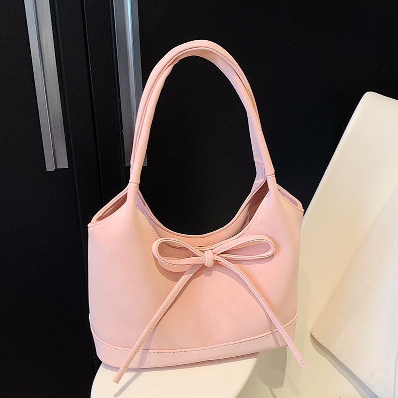 New product trend Korean sweet style niche bow portable bucket bag literary sense commuter versatile shoulder bag