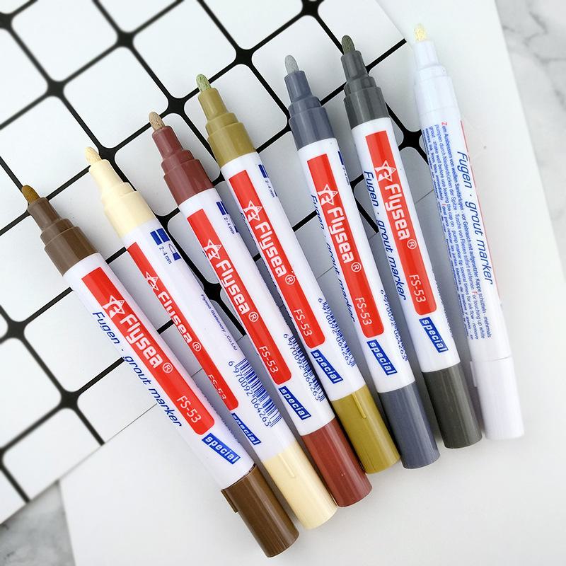 Stylo pour réparer les carreaux, les murs et les sols de salle de bain, en éliminant les interstices et la saleté. blanc