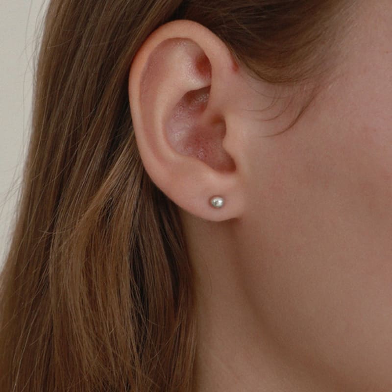 Less is more silver pebble earring