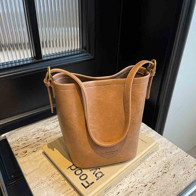 Sac à bandoulière rétro pour femmes Nouveaux sacs seau tendance en cuir PU couleur unie Grande capacité Commuter Sacs à main bandoulière