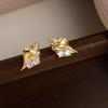 Polished Metal Conch Zircon Stud Earrings: Simple, Light Luxury Vacation Style for Women