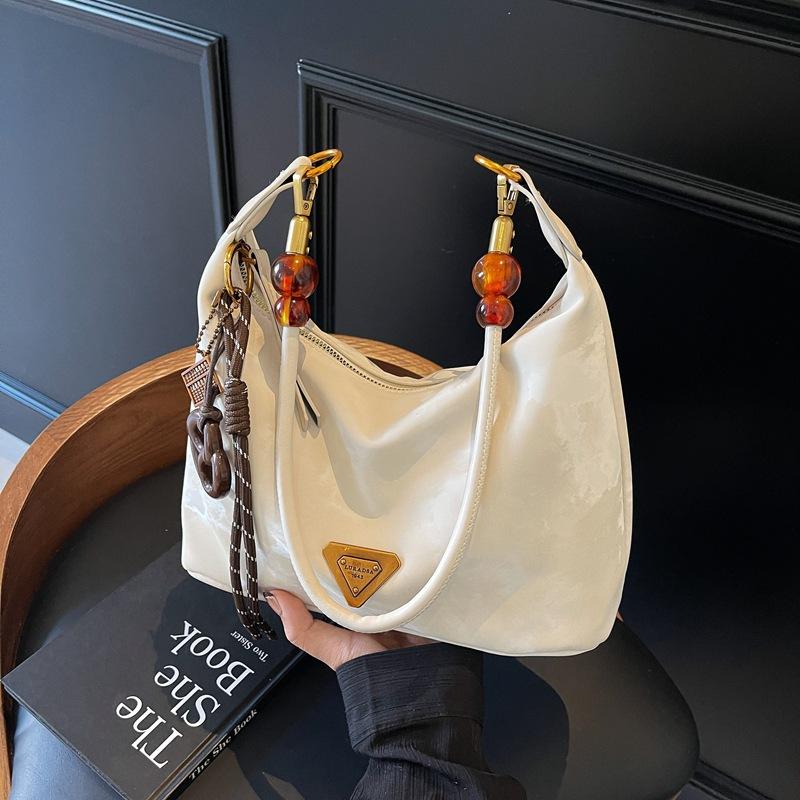 

Suede bag women s large-capacity new autumn and winter retro shoulder messenger bag premium dumpling bag бежевый