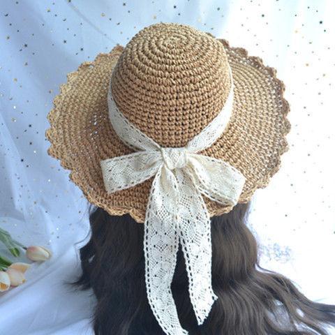 Small fresh and versatile lace strap bow hat women's summer outing big eaves beach hat scenic straw hat